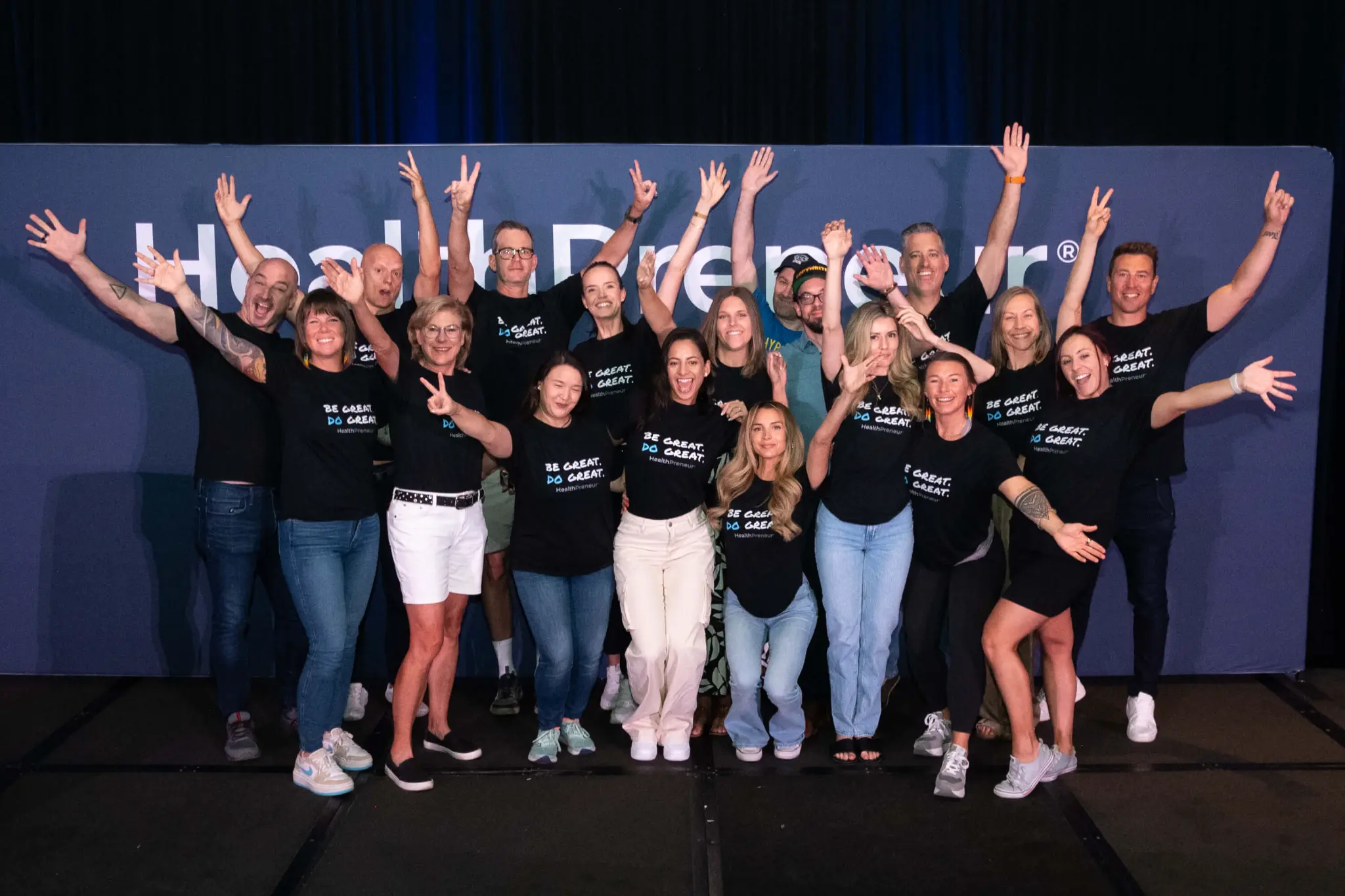 Healthpreneur team celebrating together at an event